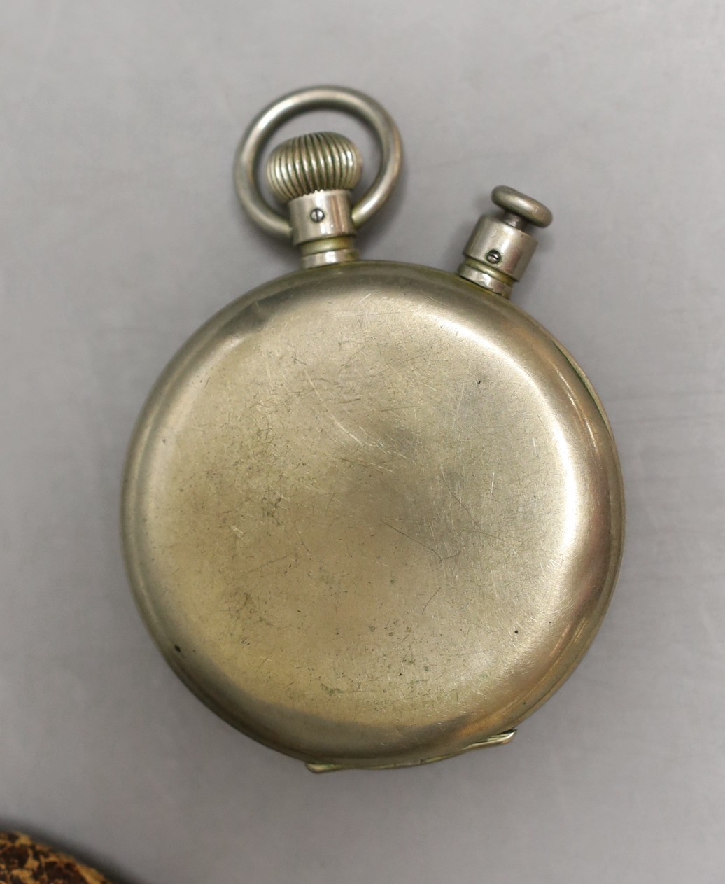A Heuer split seconds stop watch, in leather cover.